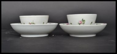 A pair of 18th century English tea bowls and sauce