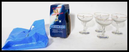 A set of four vintage 20th century Babycham white