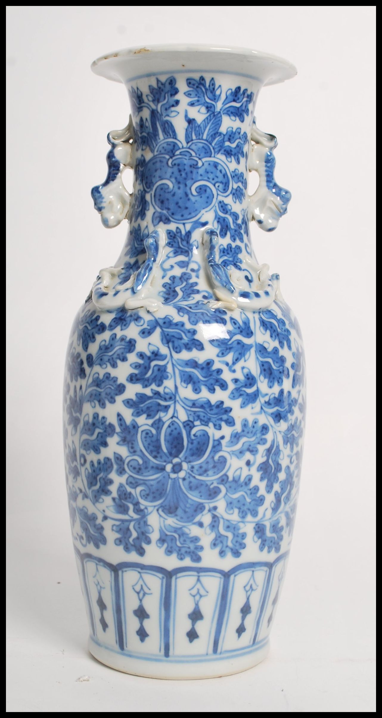 A 19th century Chinese ceramic vase having twin dr