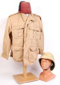 20TH CENTURY MILITARY STYLE PITH HELMET, TUNIC AND