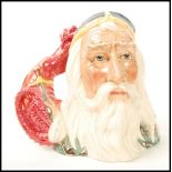 A Royal Doulton Merlin character jug, modelled by Robert F. Tabbenor ltd. ed. 846/1500 D7117.