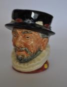 A Royal Doulton small character jug Beefeater colourway variant with yellow highlights.
