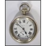 A vintage early 20th century LNER 7929 open faced, keyless wind pocket watch, over stamped three