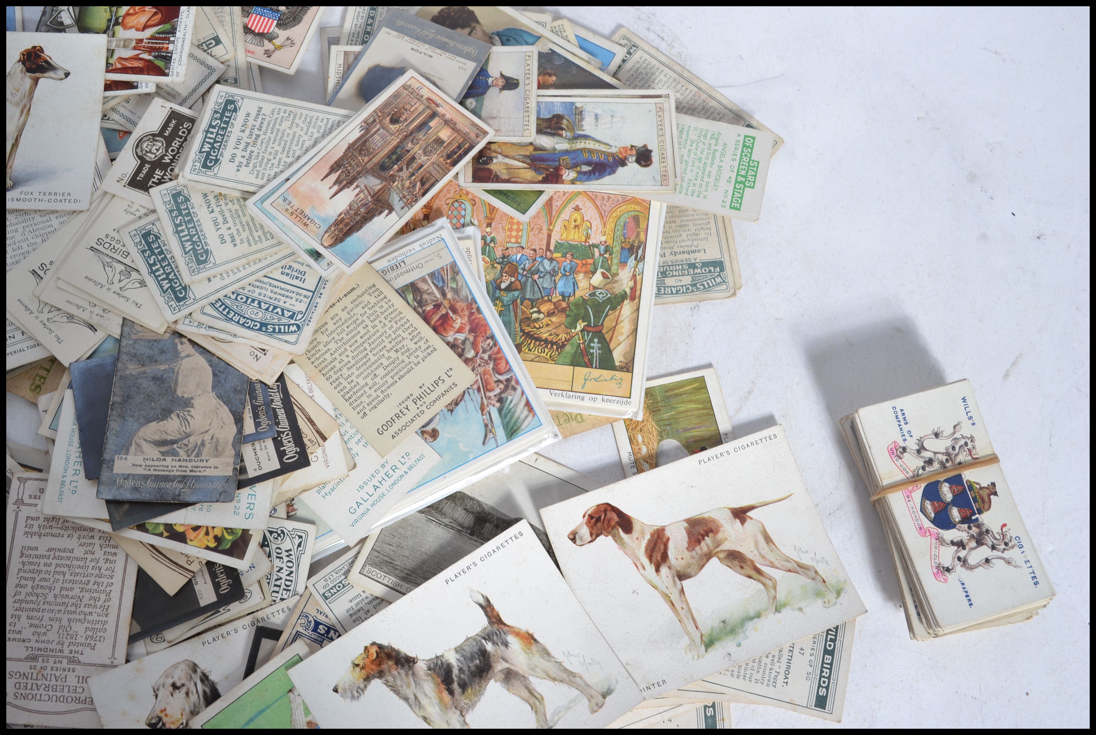 A shoe box of vintage cigarette cards , many hundreds of odds and part sets , 3 sets , Wills , - Image 4 of 6