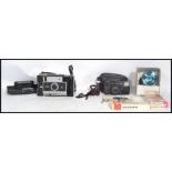 A vintage / retro 20th century cased folding Polaroid 250 automatic land camera together with a
