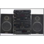 A vintage retro Pioneer music stacking system to include speakers , records player , radio ,