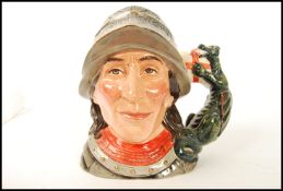 A Royal Doulton character jug entitled ' St George ' D7129, handle modelled on St Georges's Cross
