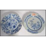 Two 18th century Chinese blue and white cabinet plates having hand painted blue and white decoration