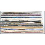 Vinyl Records - A collection of vinyl long play LP's and 12" records featuring various artists to