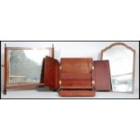 A good 19th century mahogany bathroom / toilet swing mirror raised on shaped leg supports with brass