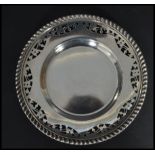 A Canadian sterling silver pin dish tray of circular form having a gadrooned edge with pierced