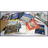 A large collection of assorted WWII German related books and publications - various subjects and