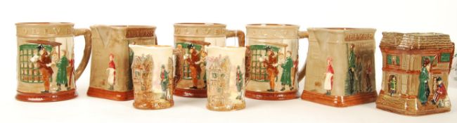 A group of eight Royal Doulton Pickwick / Dickens embossed water jugs / tankards to include three