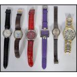 A small collection of Gents and ladies watches of various designs and makers.
