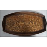 An early 20th century Sorrento ware burl wood tray having marquetry inlaid decoration depicting a