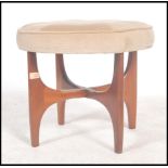 G plan - Fresco - A 1960's dressing table stool having a round beige upholstered top and supported