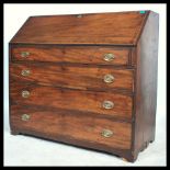 A Georgian 19th century country mahogany  large bureau desk. The oak bureau with a large chest of