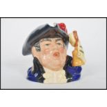 A rare Royal Doulton character jug depicting a town crier D6895 , handle modelled on a town crier'