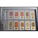 Cigarette cards; Three albums of vintage cigarette cards, all appearing to be full / complete