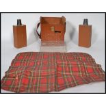 A unusual 20th century drinks flask picnic set held within a vintage pig skin bag. Consisting of two