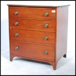 A 19th century  / early 20th century mahogany inlaid cupboard / cabinet being stylised as a chest of