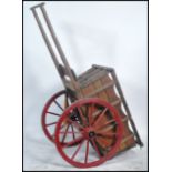 A large early 20th century rustin country wooden horse cart - carriage with large spoked wheels in