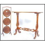 A 19th century Victorian mahogany writing table desk /  side table raised on pierced and scrolled