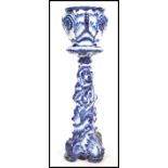 A 19th century Staffordshire ceramic blue and white foliate  jardiniere / pot stand, with blue and
