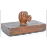 An unusual 19th century Victorian paperweight carved wooden in its construction with inscription