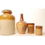 A group of Doulton salt glazed wares to include a tankard a Cheshire Cheese vase and tankard and a