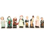 A group of eight Royal Doulton Dickensian figurines to include Bumble , Scrooge , Mrs Bardell ,