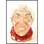 A Royal Doulton character jug " The Clown ", model 6322, variation three with white hair and