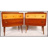 A pair of mid century retro chest of drawers. Each raised on ebonised dansette style legs with a