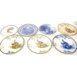 A group of seven Royal Doulton plates to include four Pheasant plates a Gibson Girl plate etc.