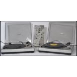 A pair of Gemini XL - 200 mixing record belt drive turntable decks together with a Gemini PMX 60
