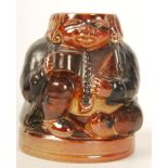 A Doulton Lambeth Toby Harry Simeon Inkwell modelled in a seated position smoking a pipe.