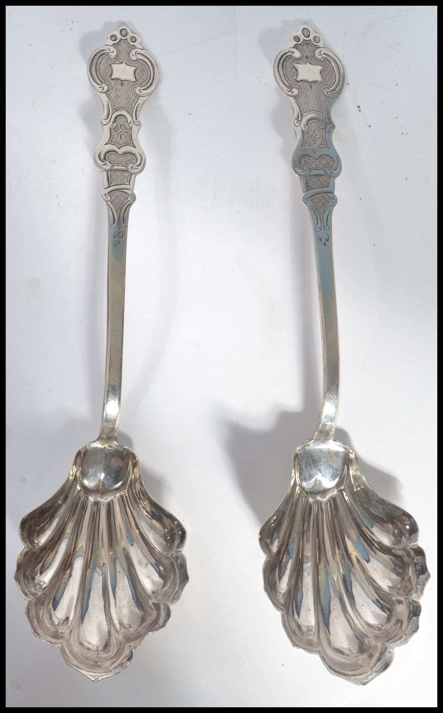 A pair of American silver 13/16 purity serving spo