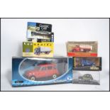 A group of boxed diecast models of various scales to include a Solido large scale Renault 4 a