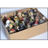 A group of vintage 20th century drinks miniatures to include Beswick bull , seal etc. studio art