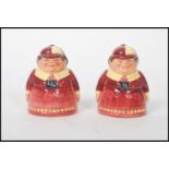 Pair of Royal Doulton Tweedle Dee and Tweedle Dum salt and pepper pots, D7122 in boxes. Measures