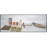 A collection of vintage curios to include 19th century bone spoons, thimbles, needle case in the