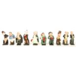 A group of ten Royal Doulton Dickensian figurines to include Pecksniff , Jingle , Buzfuz , Tony