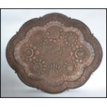 A stunning large possibly 19th century decorative fret pierced scalloped design shaped Islamic /