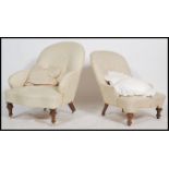 A pair of 19th century ladies and gents Victorian mahogany armchairs /  chairs, button back