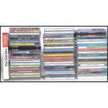 A collection of Compact Discs featuring various artists to include Blur, The Charlatans, David Gray,