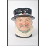 A rare Royal Doulton prototype Character jug Beefeater D6206 in black and gold with Doulton stamps