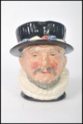 A rare Royal Doulton prototype Character jug Beefeater D6206 in black and gold with Doulton stamps
