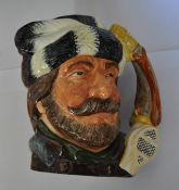 A Royal Doulton character jug The Trapper colourway with black outlined snow shoes and coloured horn