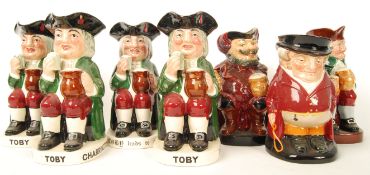 A group of seven Royal Doulton Character Toby jugs to include Toby ALe x2 , Charrington's One