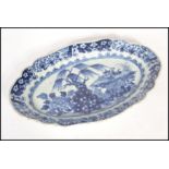 A 19th century Chinese blue and white hand painted porcelain plate / platter tray having
